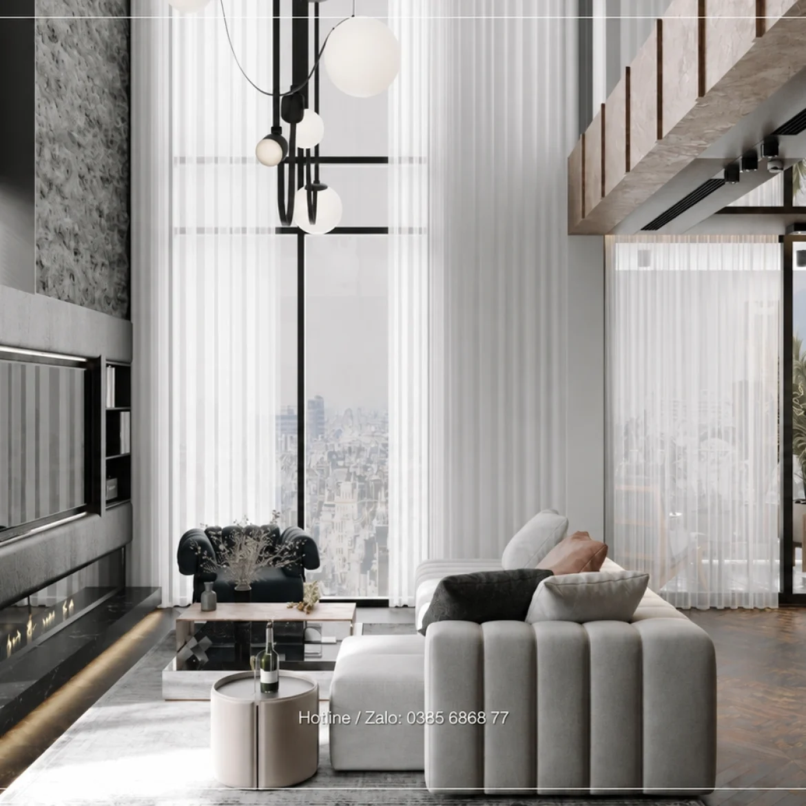 Phòng khách thông tầng với sofa xám và cửa kính cao