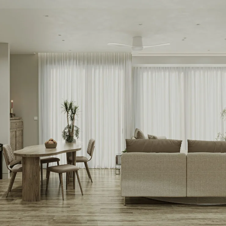 Sofa sáng màu, bàn ăn bo góc và góc đàn piano cạnh cửa sổ