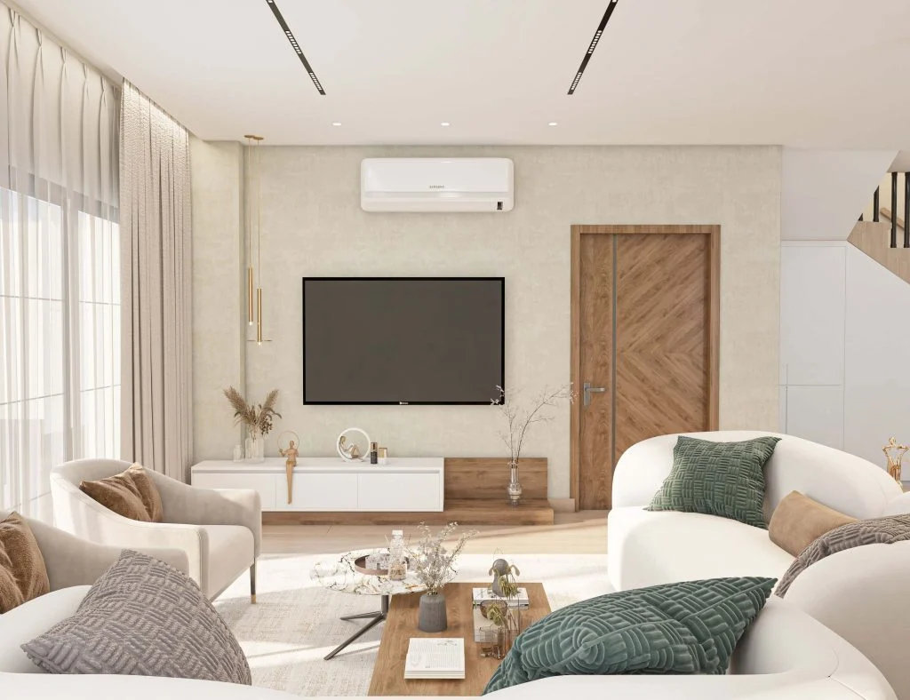 Phòng khách Ocean Park với sofa bo cong và vách TV sáng màu