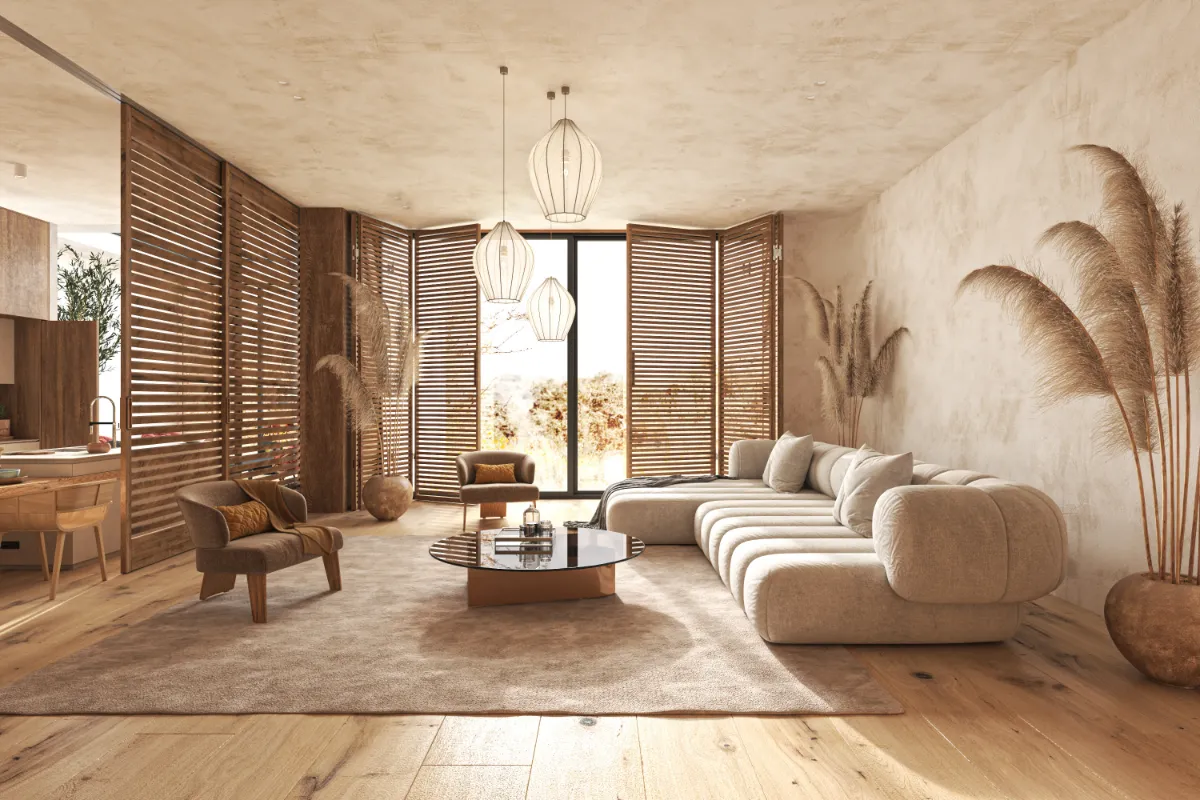 Phòng khách tông kem với sofa bo tròn, đồ gỗ và cửa chớp