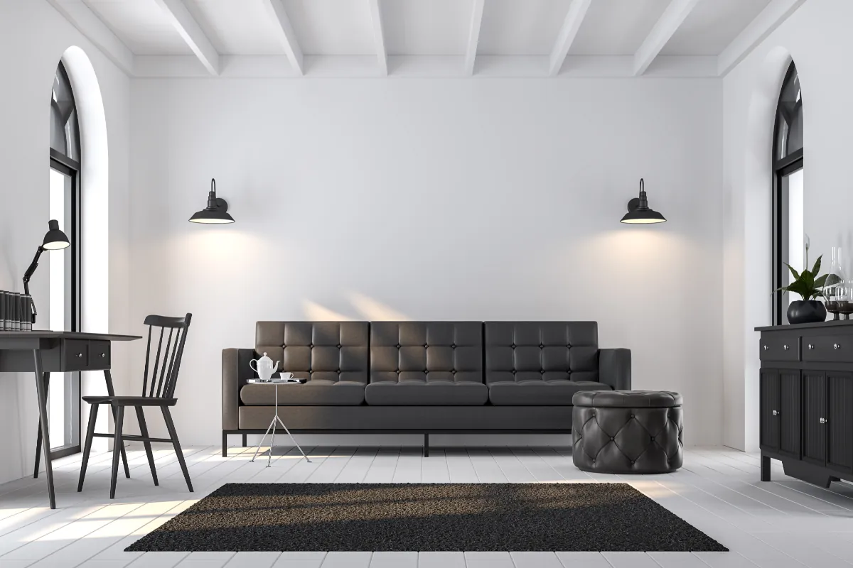 Sofa và đồ nội thất đen tương phản với tường và sàn trắng